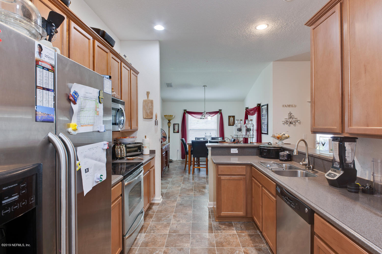 16357 Tisons Bluff Road Jacksonville, FL 32218 - Photo 9 of 31 a kitchen with lots of counter top space