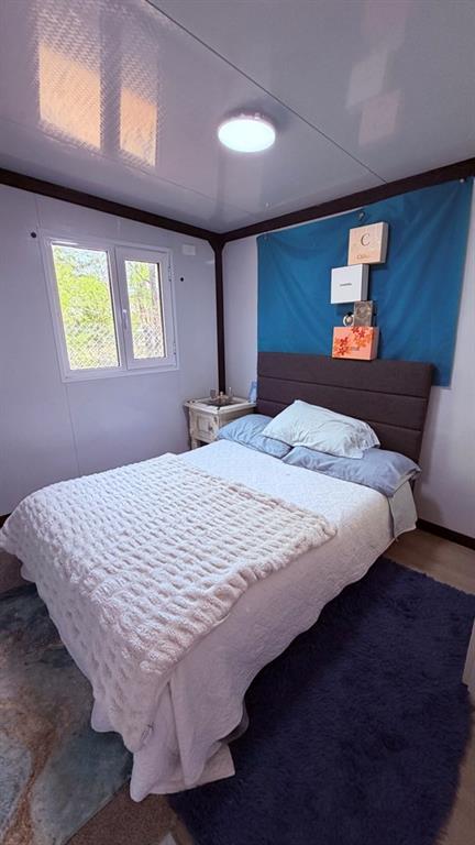 149 South Oak Tree Kemp, TX 75143 - Photo 12 of 14 a bedroom with a bed and window