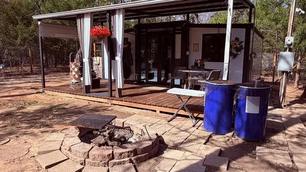 a view of a house with sitting area