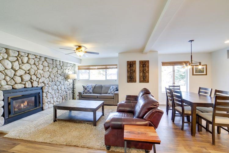 591 Golden Creek Road, Unit 591 Mammoth Lakes, CA 93546 - Photo 5 of 19 a living room with furniture and a fireplace