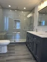 a view of a porch with furniture and a yard