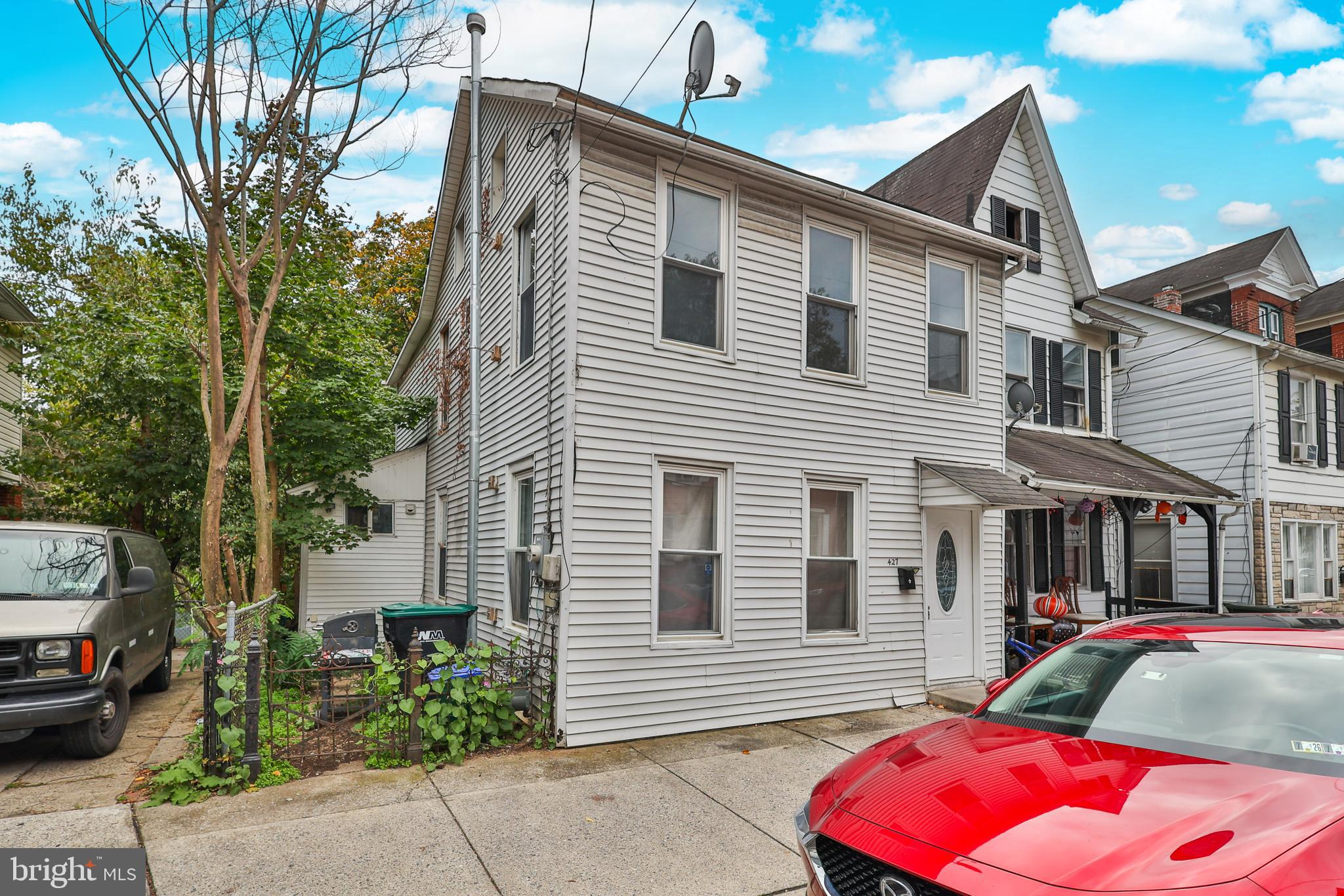 a front view of a house with a garage