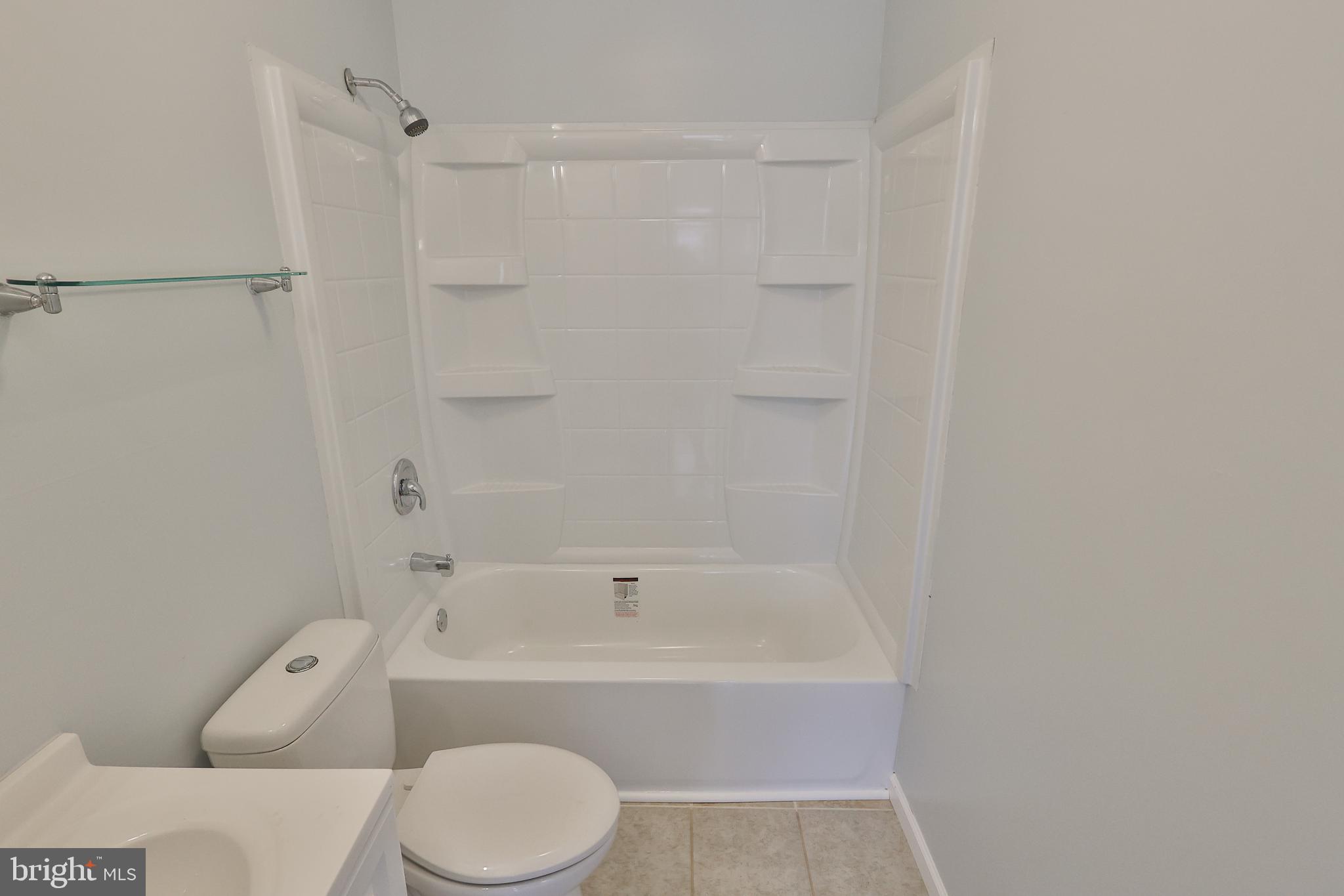 427 Pawnee Street Bethlehem, PA 18015 - Photo 22 of 39 a bathroom with a bathtub toilet and sink
