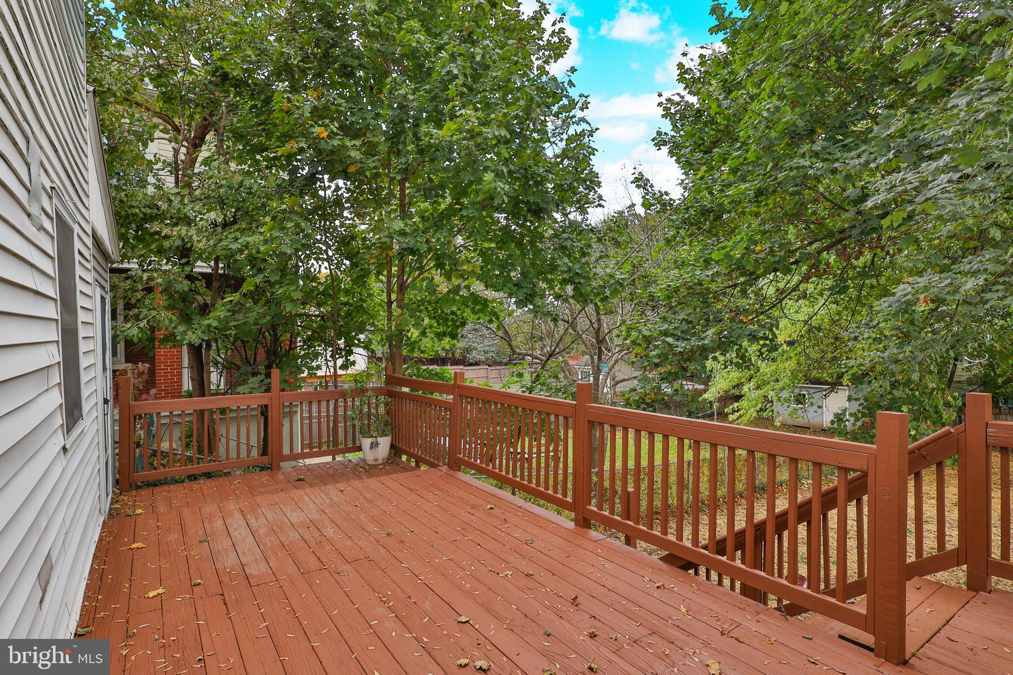 427 Pawnee Street Bethlehem, PA 18015 - Photo 32 of 39 a view of deck with two couches and wooden floor