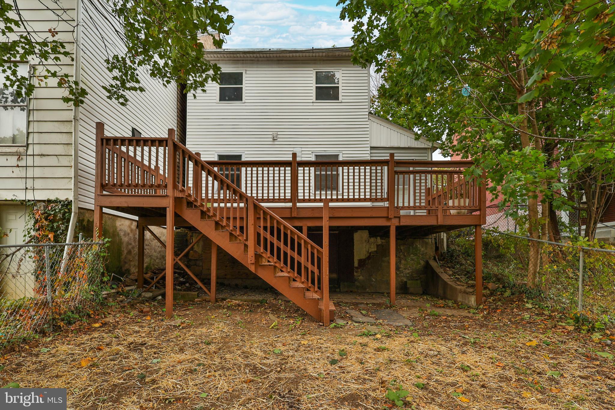 427 Pawnee Street Bethlehem, PA 18015 - Photo 36 of 39 a view of a house with a deck and a yard