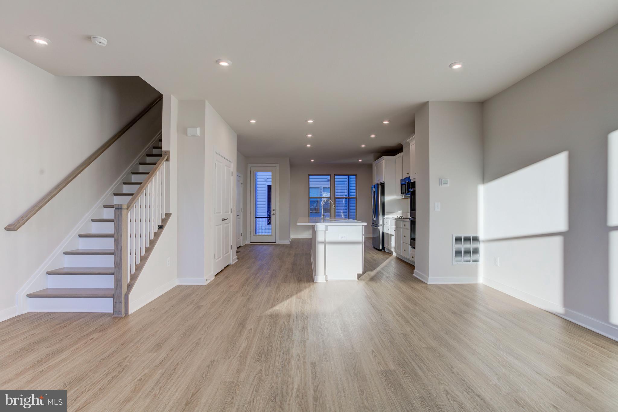 13172 Arches Road Herndon, VA 20170 - Photo 11 of 31 a view of kitchen with furniture and wooden floor