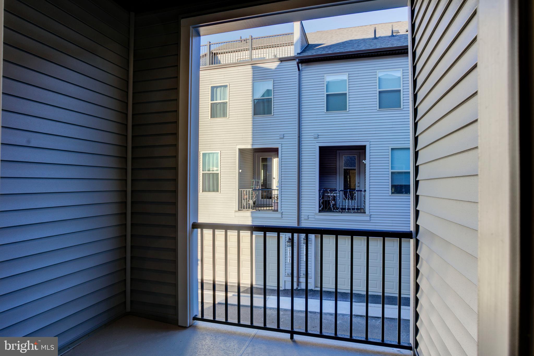 13172 Arches Road Herndon, VA 20170 - Photo 13 of 31 a view of a brick house with a window