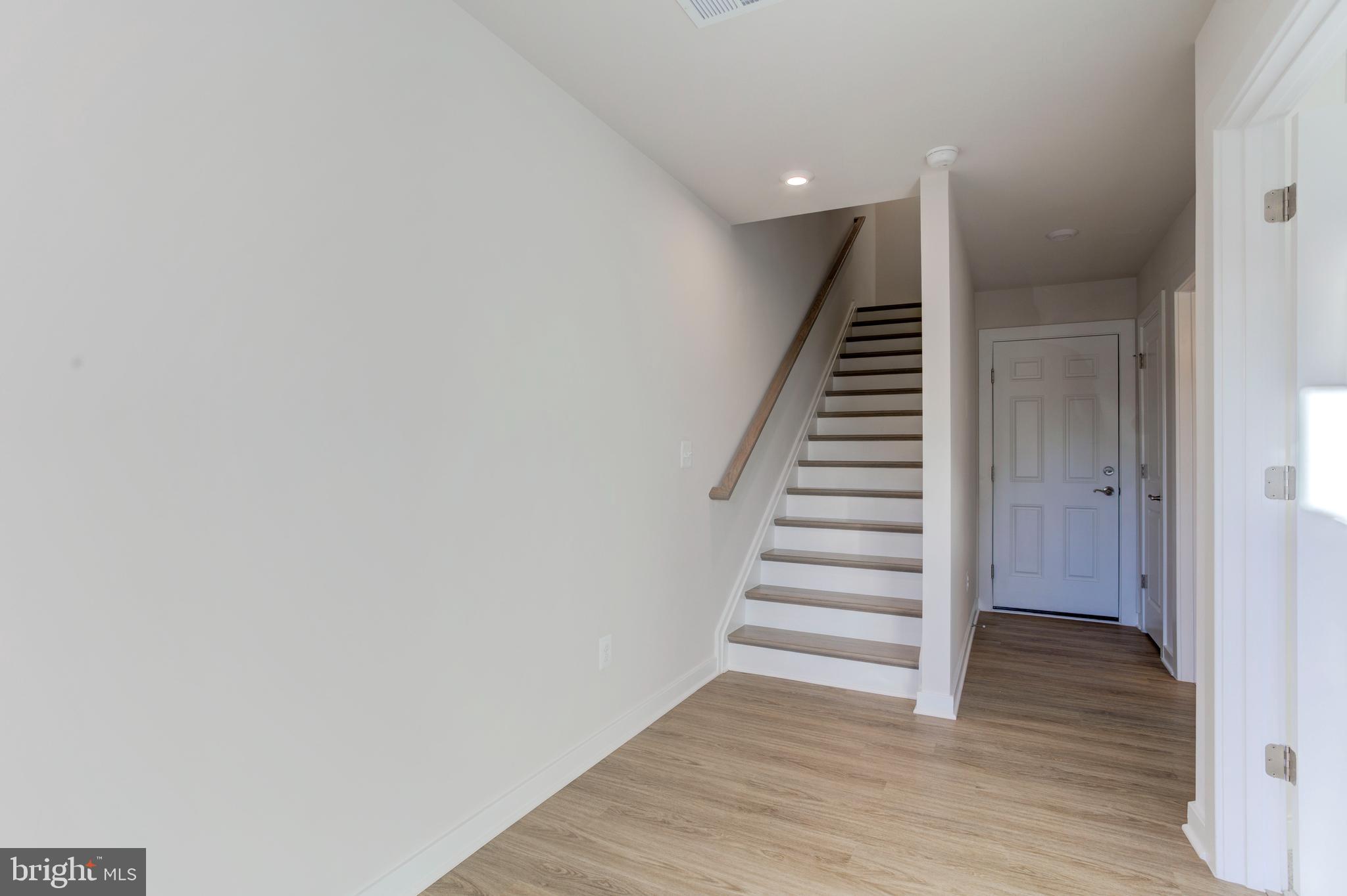 13172 Arches Road Herndon, VA 20170 - Photo 14 of 31 a view of entryway with wooden floor