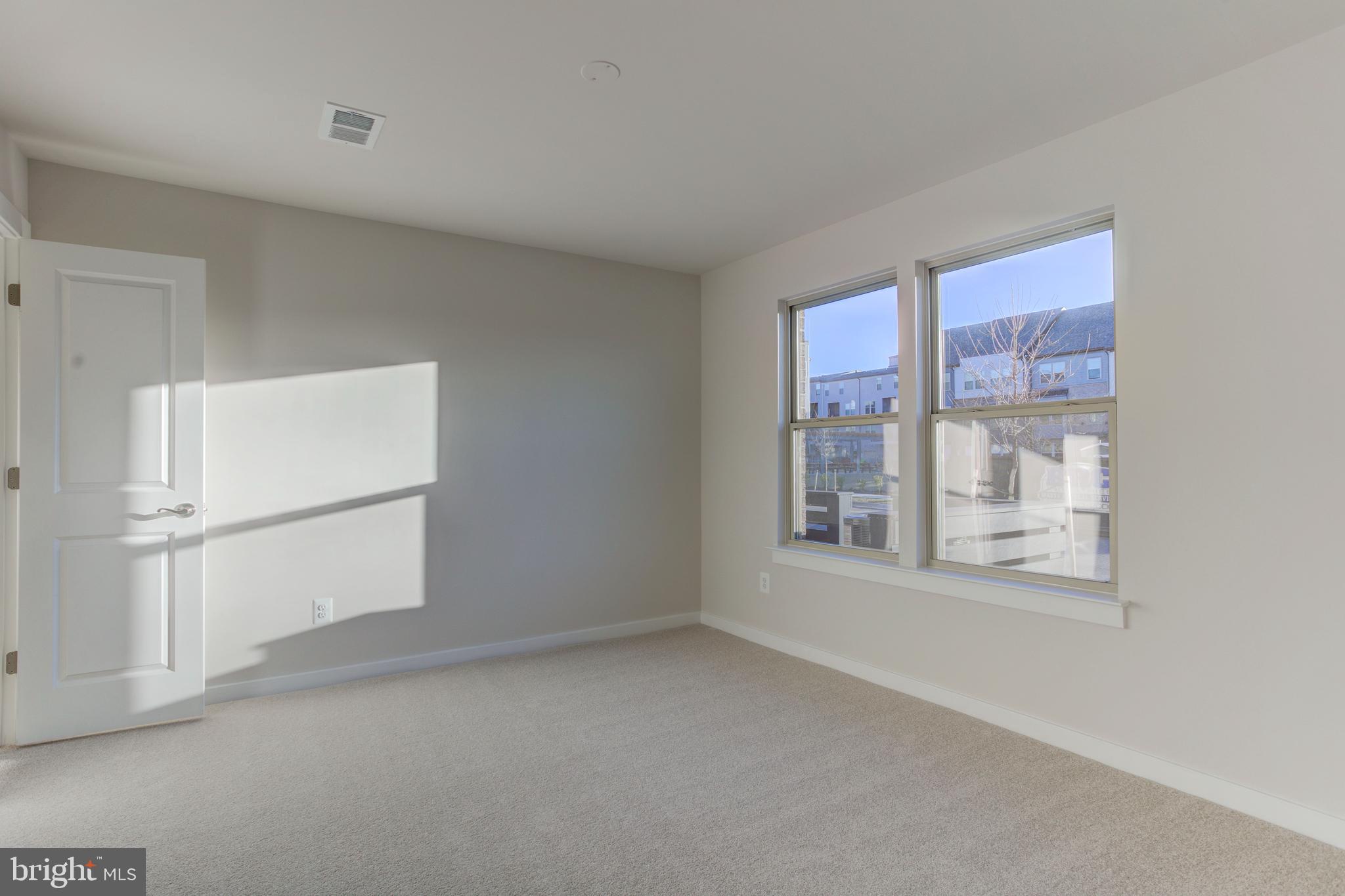 13172 Arches Road Herndon, VA 20170 - Photo 15 of 31 a view of an empty room with a window