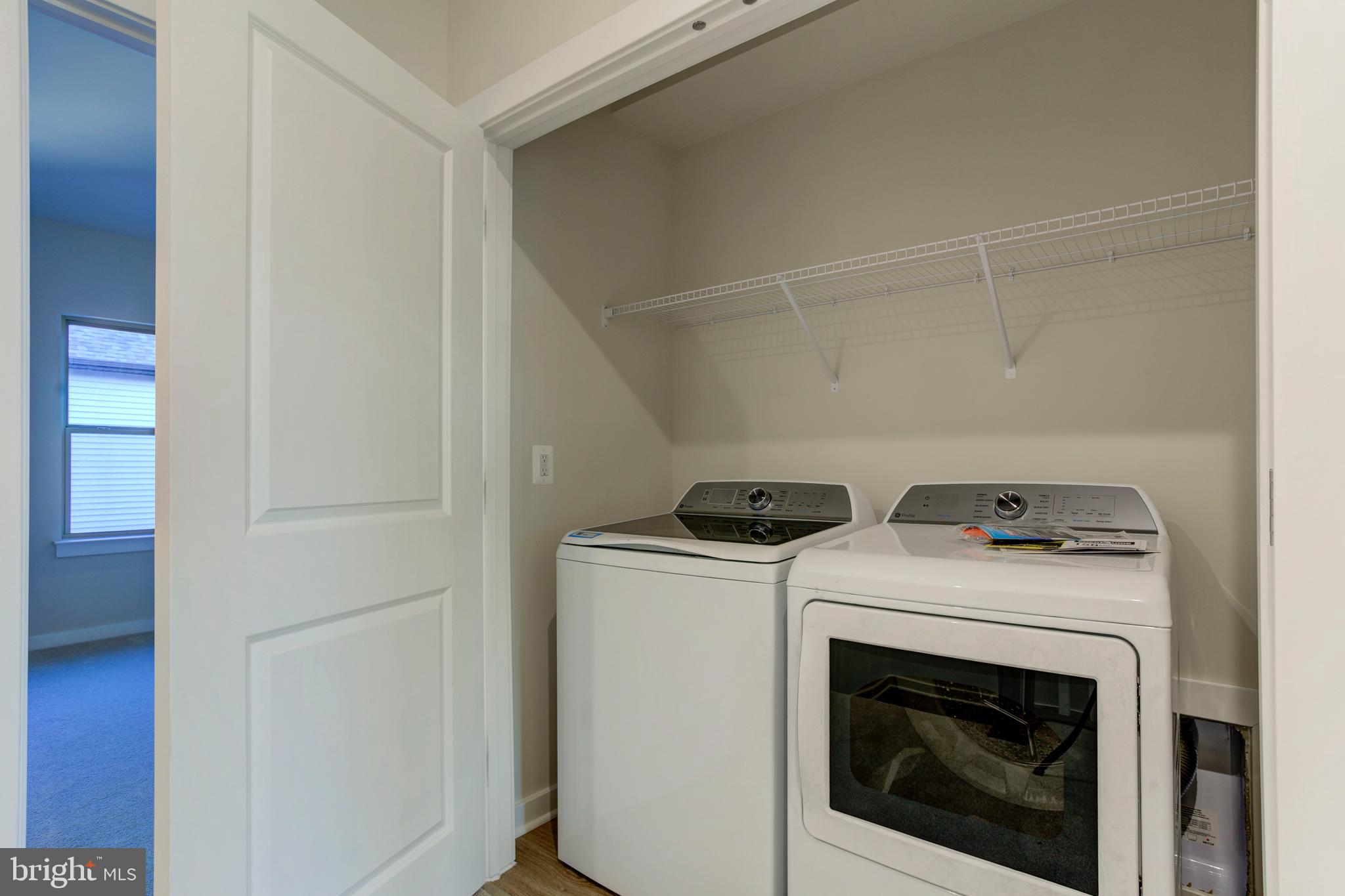 13172 Arches Road Herndon, VA 20170 - Photo 30 of 31 a utility room with dryer and washer