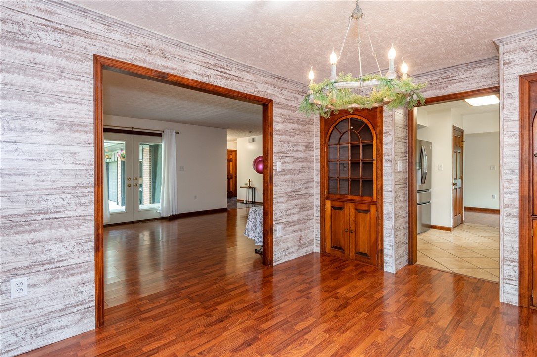 6750 Little Twin Road Germantown, OH 45327 - Photo 18 of 88 This inviting space features elegant hardwood flooring and classic architectural details.