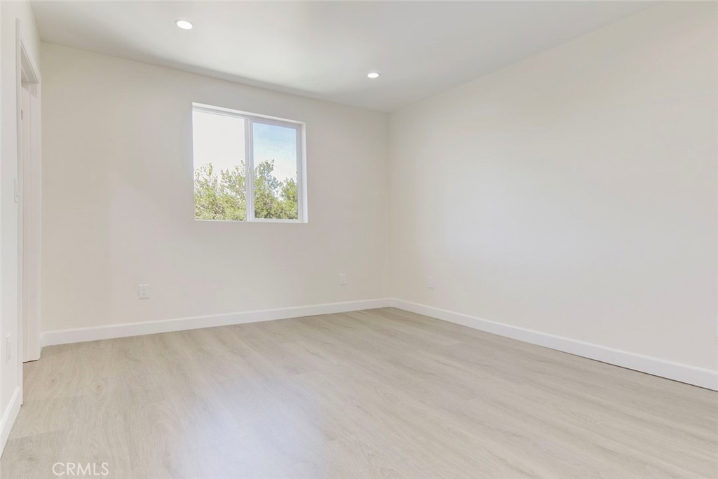 7044-2 Greeley Street Tujunga, CA 91042 - Photo 13 of 20 an empty room with a window