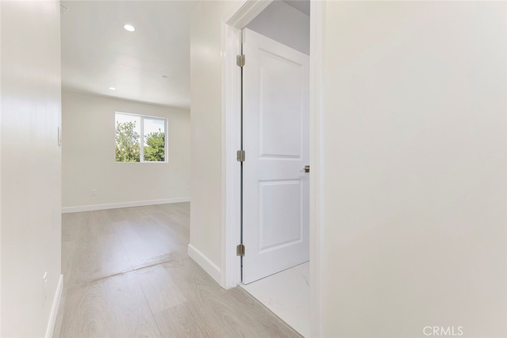 7044-2 Greeley Street Tujunga, CA 91042 - Photo 16 of 20 an empty room with windows and closet