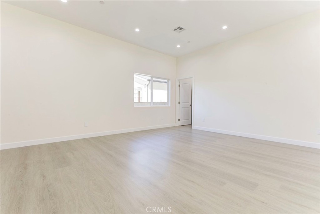 7044-2 Greeley Street Tujunga, CA 91042 - Photo 5 of 20 an empty room with windows