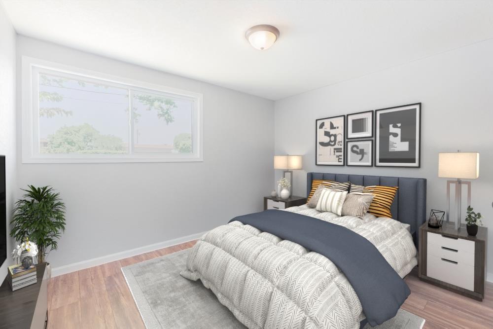 3490 Royal Road Concord, CA 94519 - Photo 11 of 17 a bedroom with a bed and a potted plant