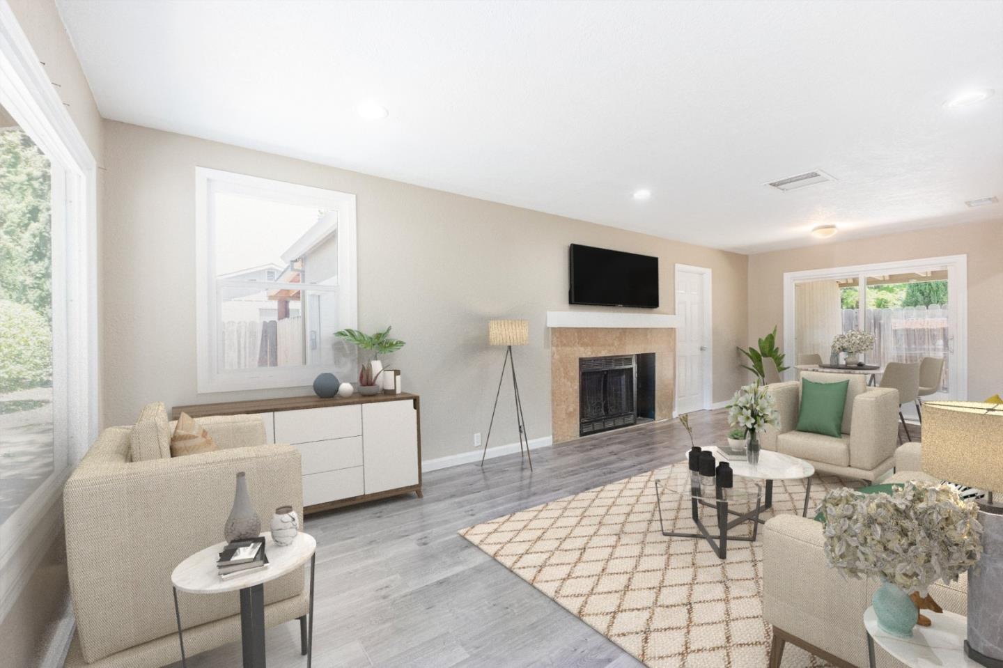 3490 Royal Road Concord, CA 94519 - Photo 3 of 17 a living room with furniture a fireplace and a flat screen tv