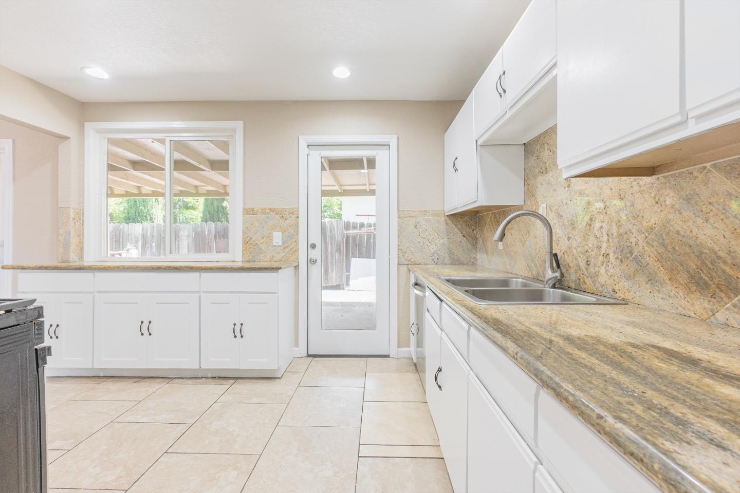 3490 Royal Road Concord, CA 94519 - Photo 6 of 17 a kitchen with a sink and cabinets
