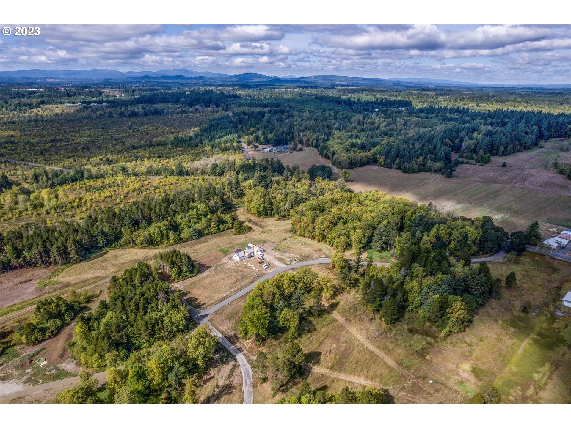 128 Lacamas Lane Winlock, WA 98596 - Photo 1 of 26 a view of lake and mountain