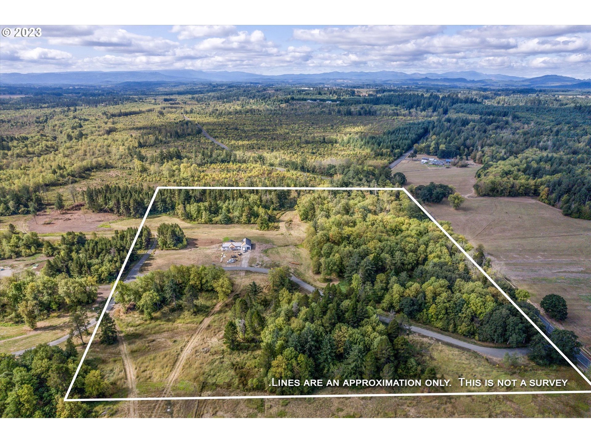 128 Lacamas Lane Winlock, WA 98596 - Photo 24 of 26 a view of a city with a lake