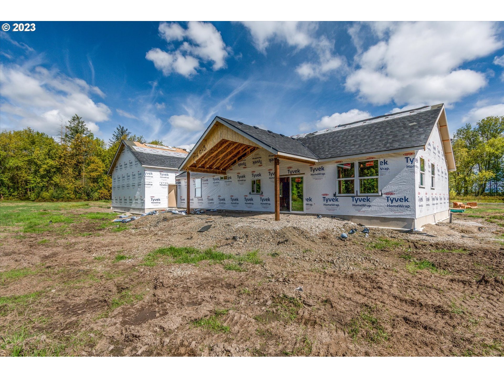 128 Lacamas Lane Winlock, WA 98596 - Photo 8 of 26 a view of a house with a backyard