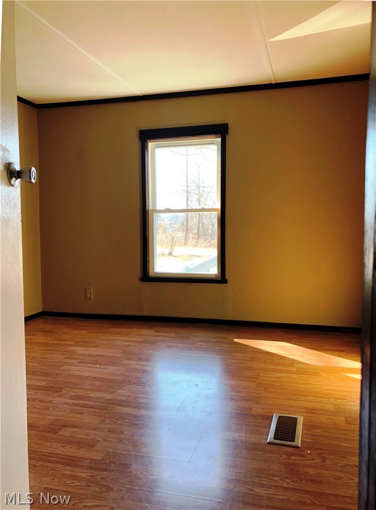 6226 Ferndale Road Ravenna, OH 44266 - Photo 19 of 21 6226 Ferndale Rd, Ravenna, OH 44266-8842 - another shot of bedroom 3 with lots of natural light