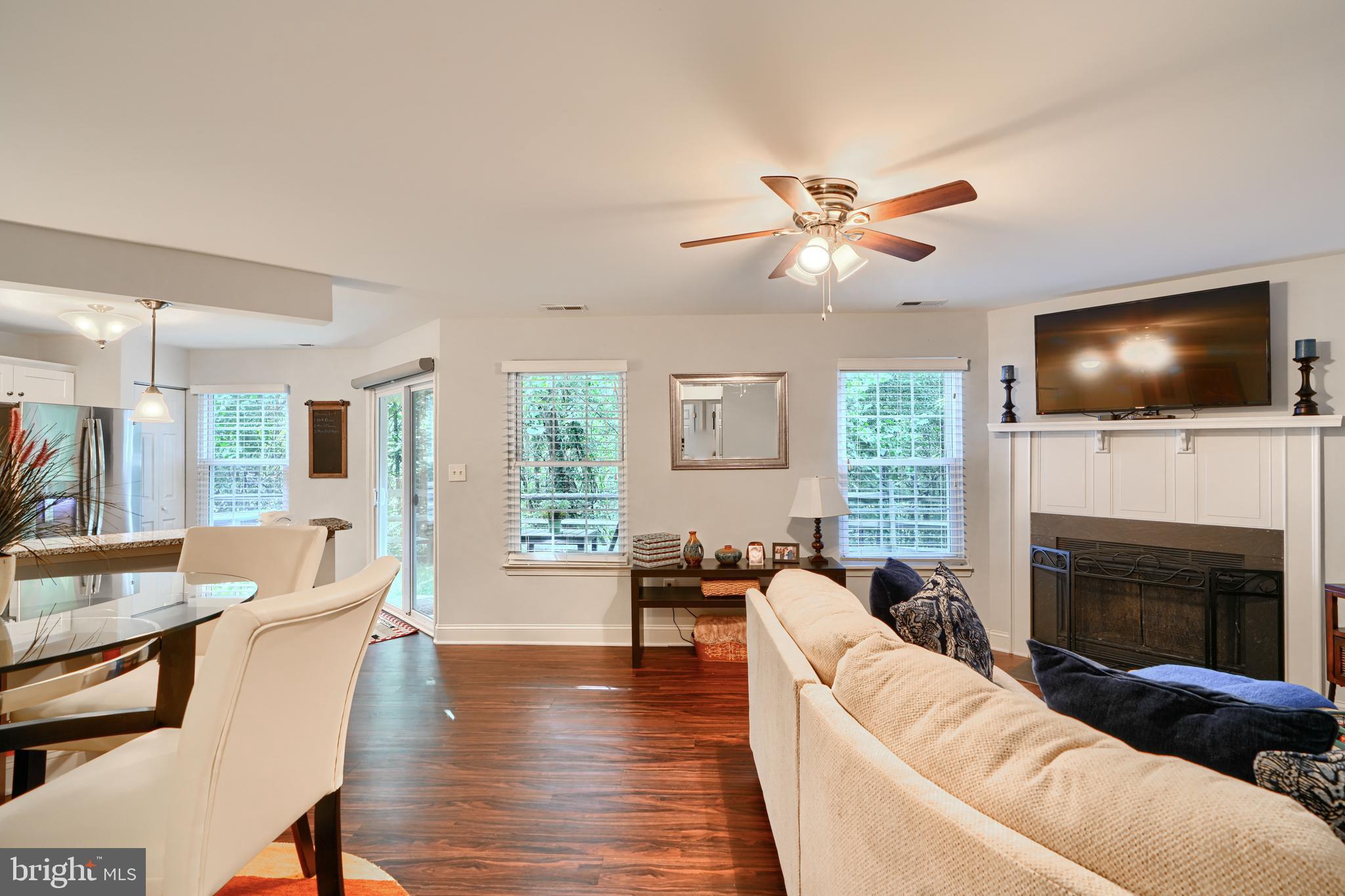 40 Surrey Lane, Unit 122 Nottingham, MD 21236 - Photo 15 of 31 a living room with furniture fireplace and flat screen tv