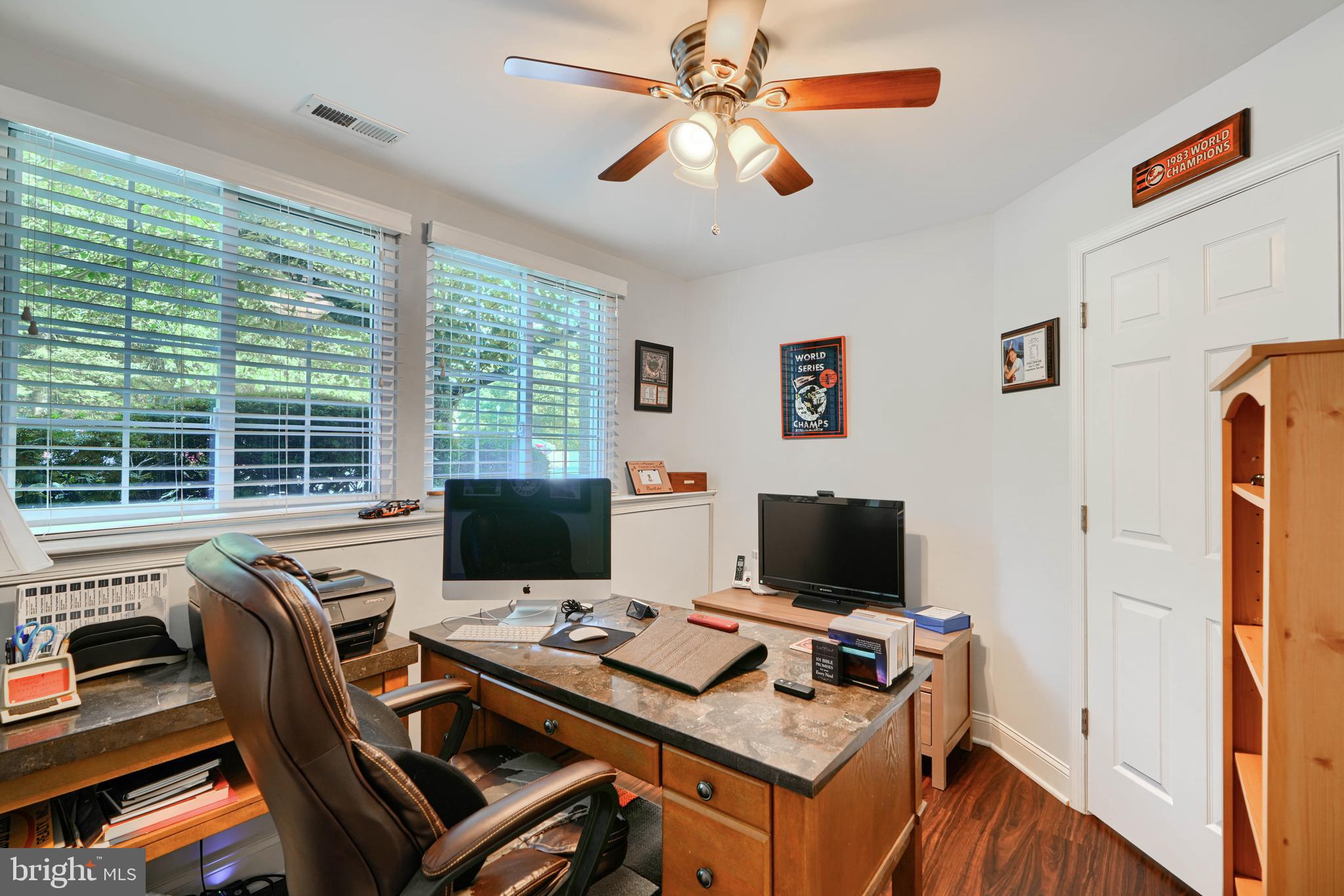 40 Surrey Lane, Unit 122 Nottingham, MD 21236 - Photo 19 of 31 a view of a workspace with furniture and a flat screen tv