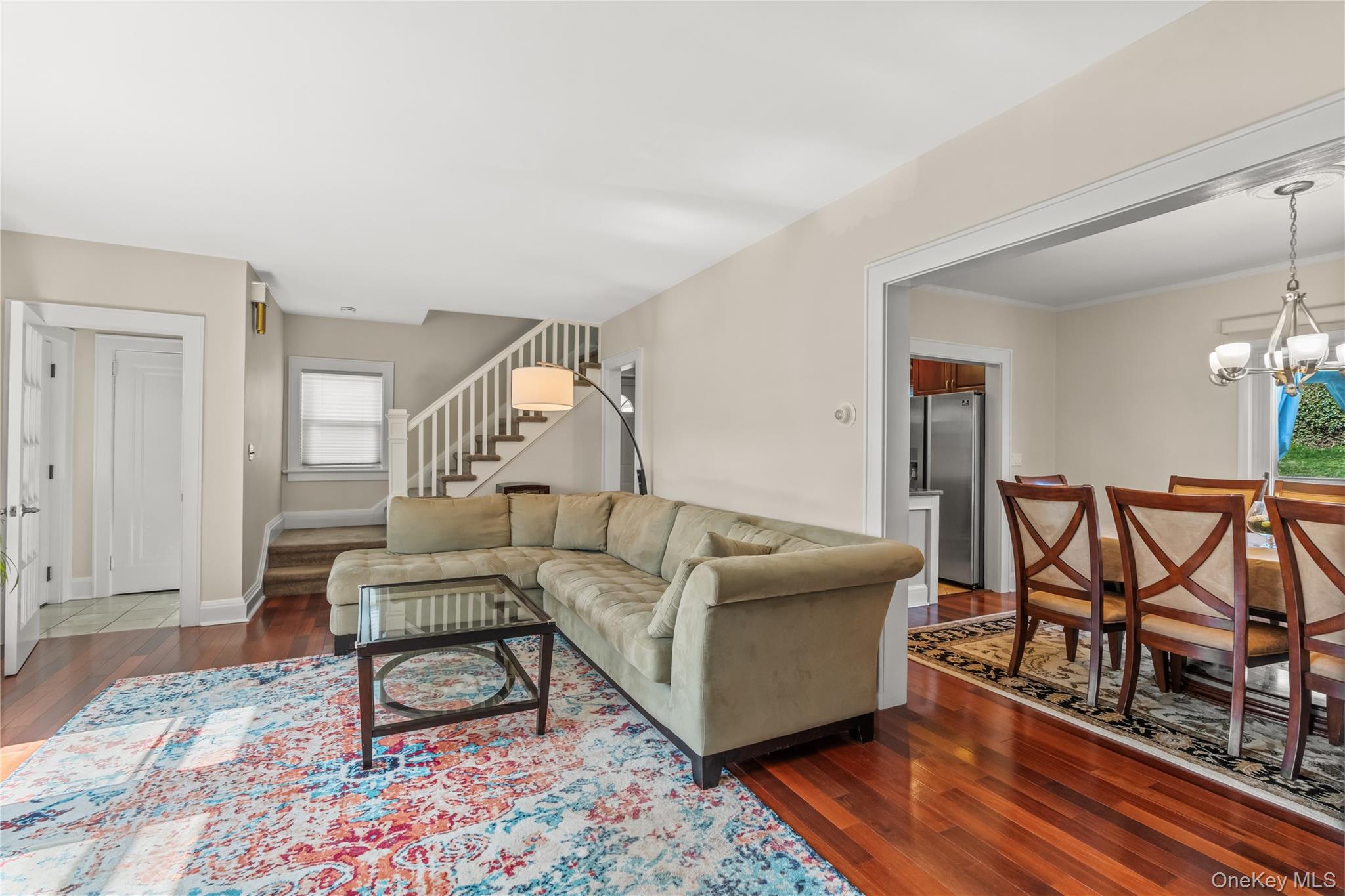 35 Lispenard Avenue New Rochelle, NY 10801 - Photo 11 of 37 a living room with furniture and a wooden floor