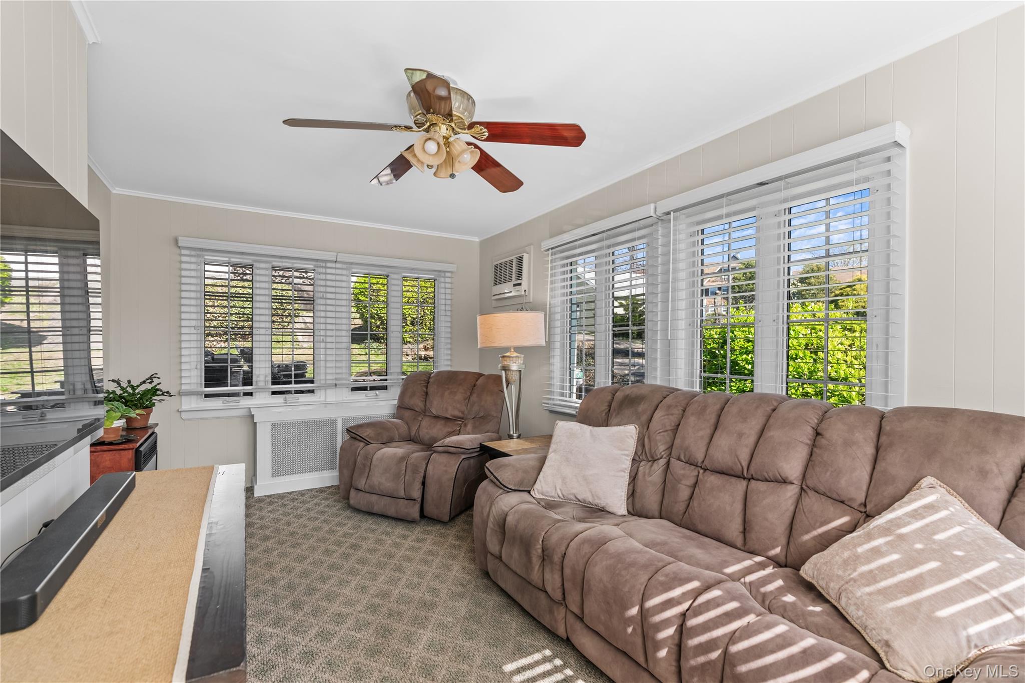 35 Lispenard Avenue New Rochelle, NY 10801 - Photo 13 of 37 a living room with furniture and a large window