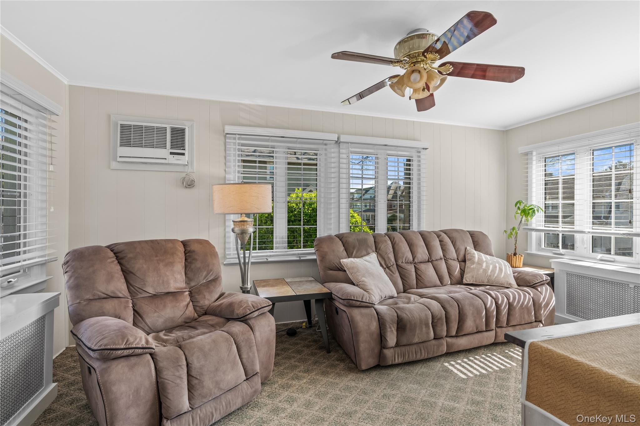 35 Lispenard Avenue New Rochelle, NY 10801 - Photo 14 of 37 a living room with furniture and a large window