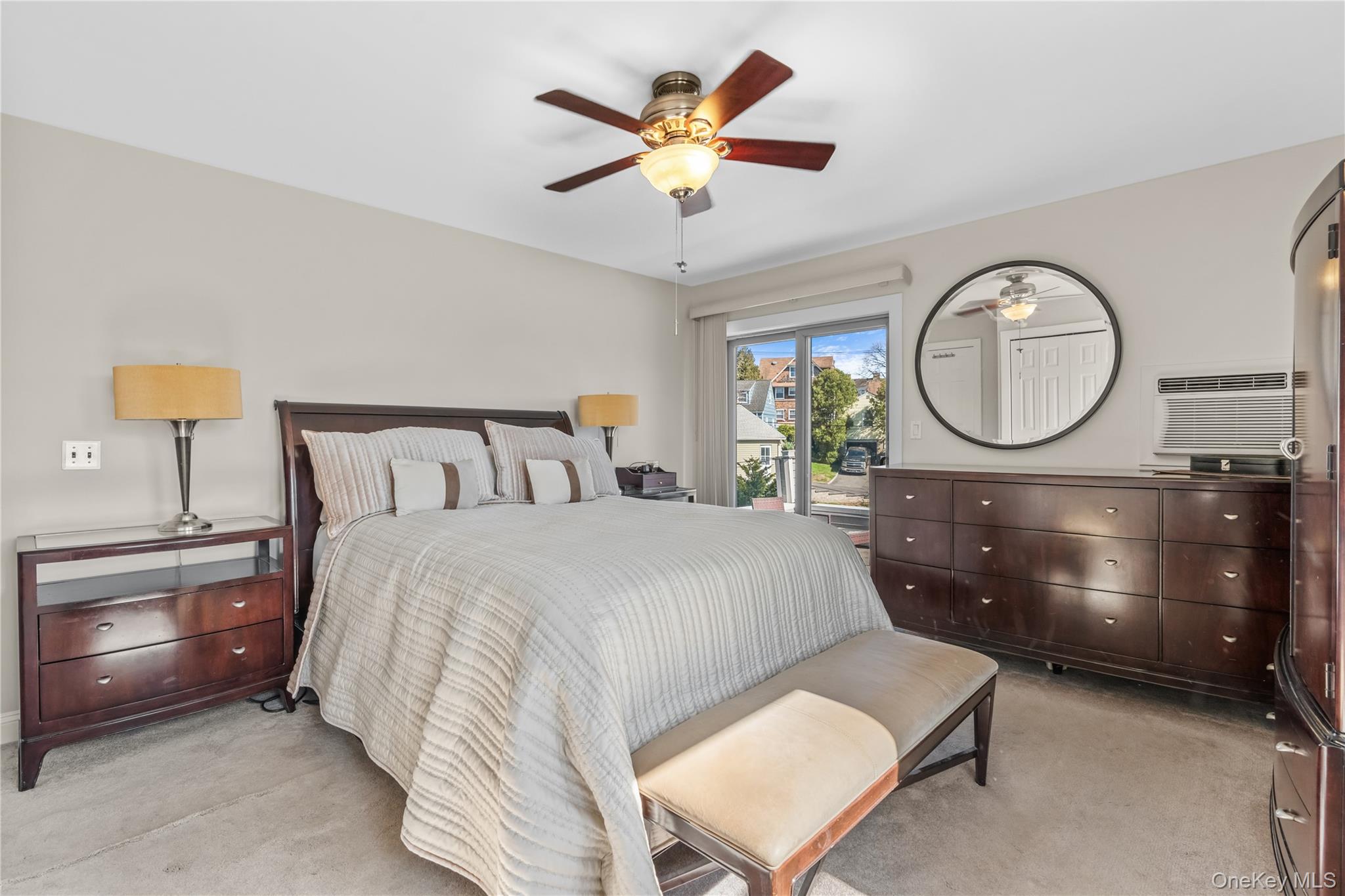 35 Lispenard Avenue New Rochelle, NY 10801 - Photo 15 of 37 a bed room with a bed and a chandelier