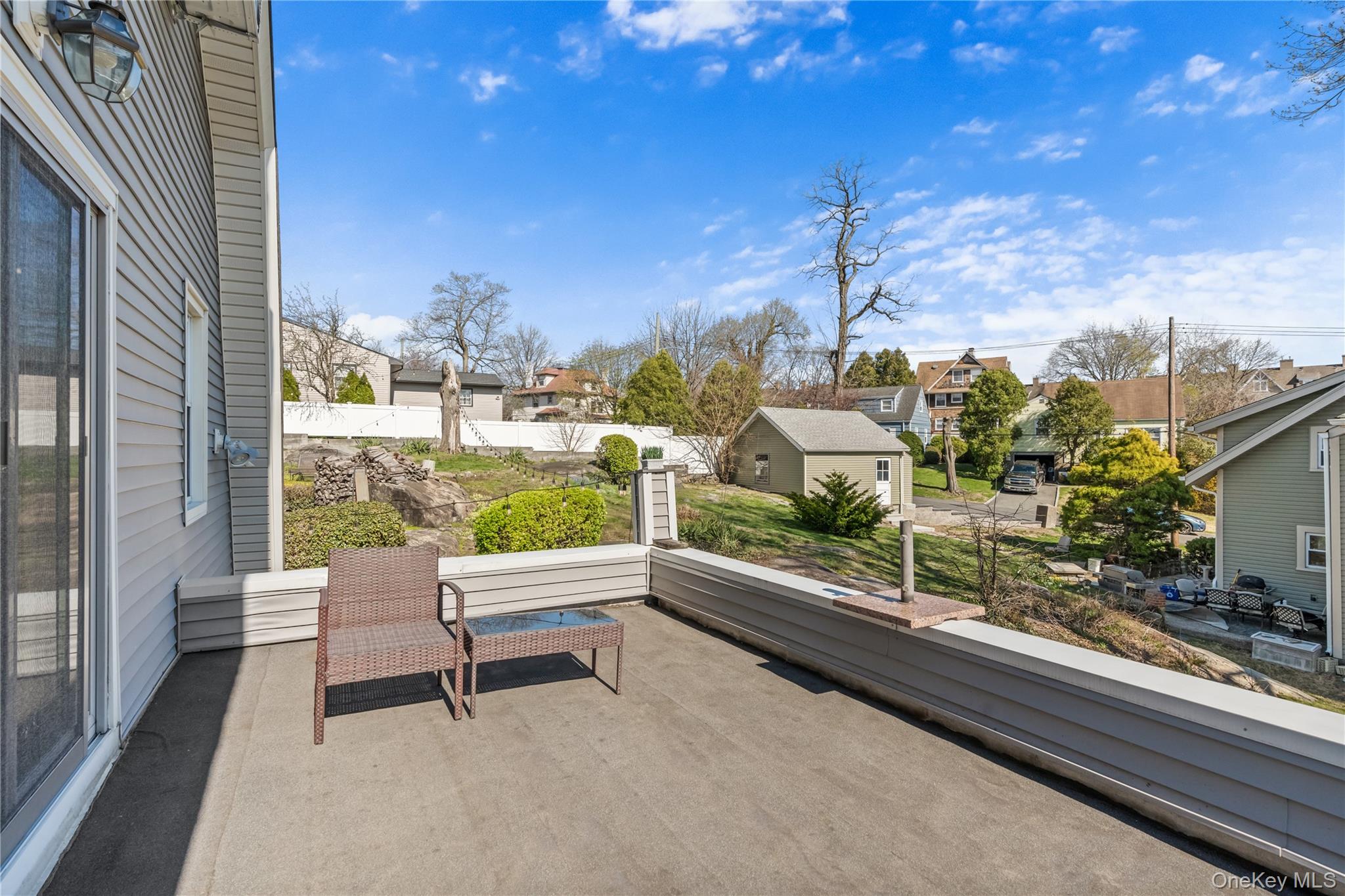 35 Lispenard Avenue New Rochelle, NY 10801 - Photo 18 of 37 a view of a balcony with chairs