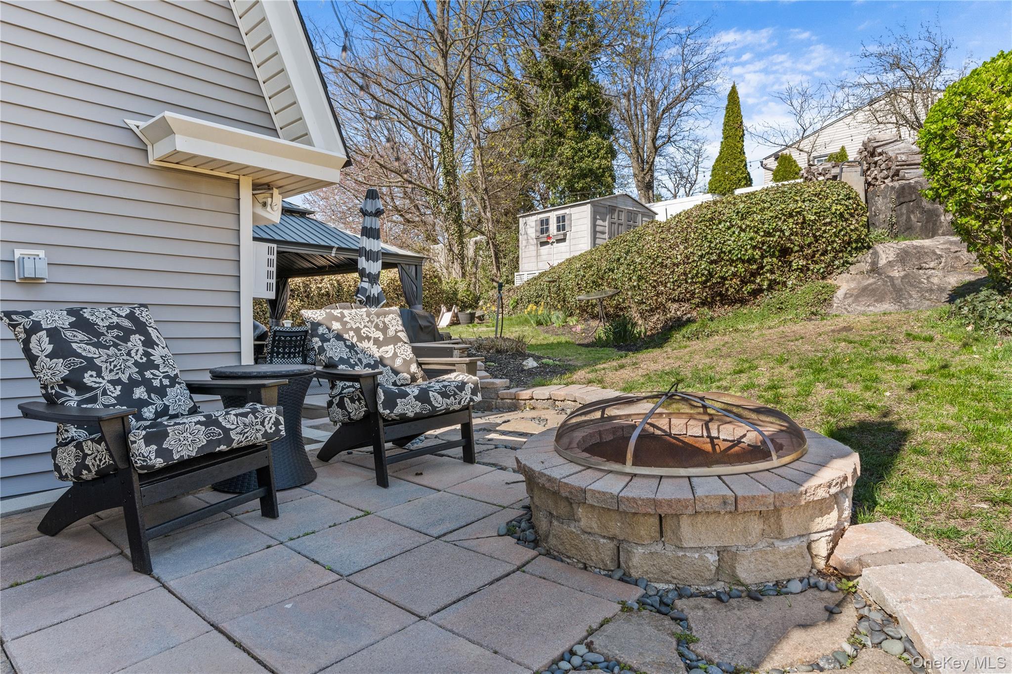 35 Lispenard Avenue New Rochelle, NY 10801 - Photo 30 of 37 a view of a chairs and table in backyard
