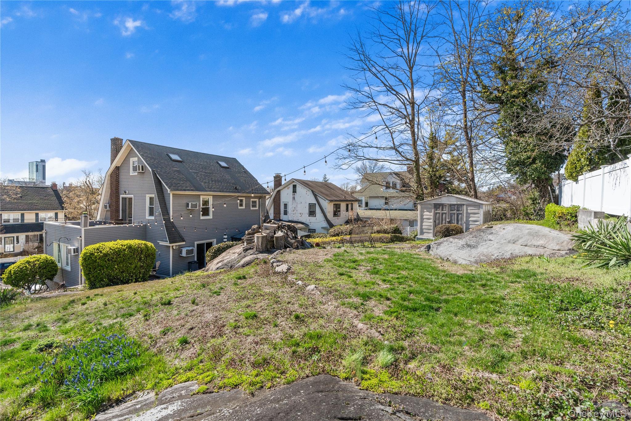 35 Lispenard Avenue New Rochelle, NY 10801 - Photo 34 of 37 a view of a house with a yard
