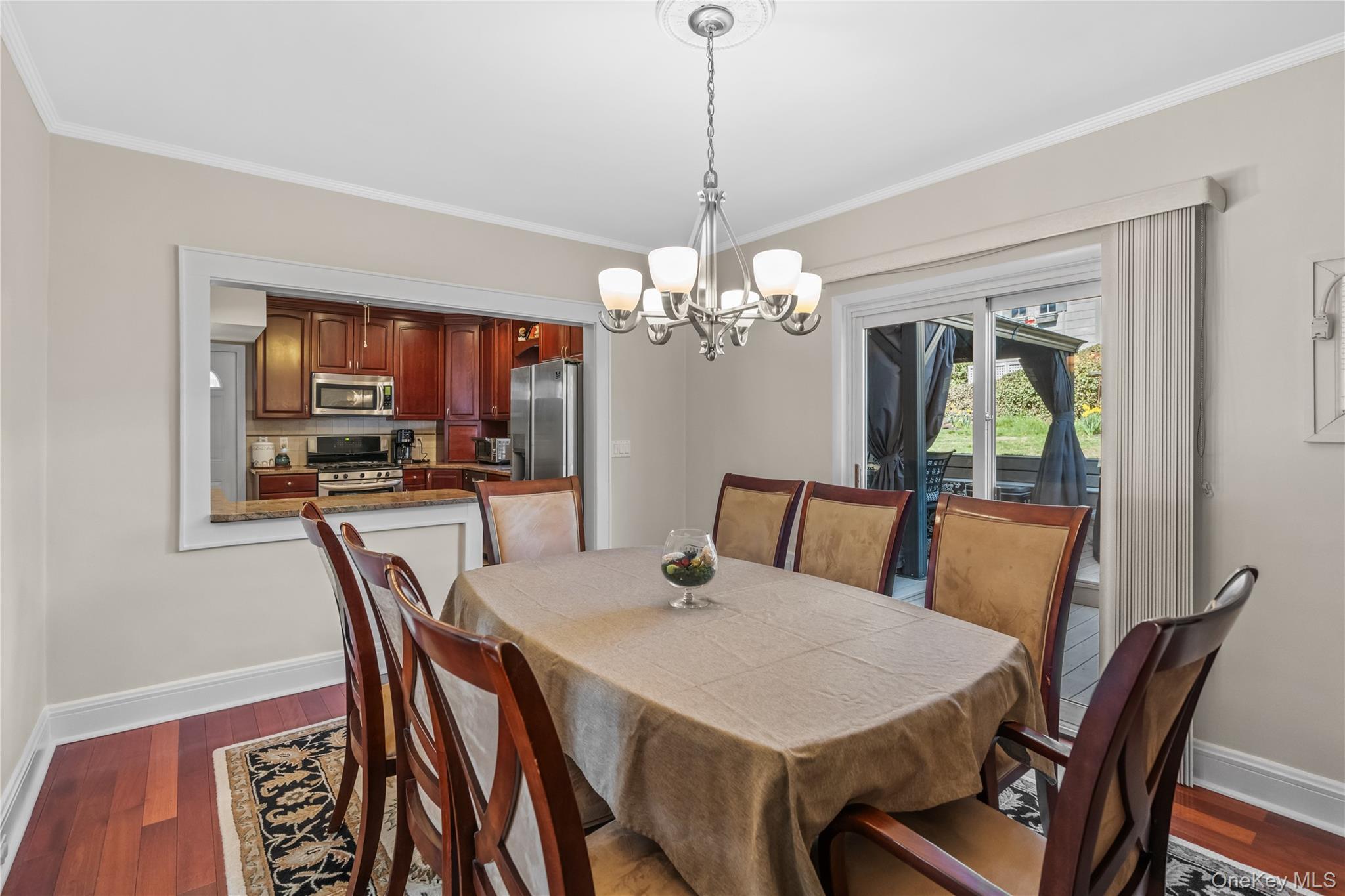 35 Lispenard Avenue New Rochelle, NY 10801 - Photo 8 of 37 a view of a dining room with furniture window and wooden floor