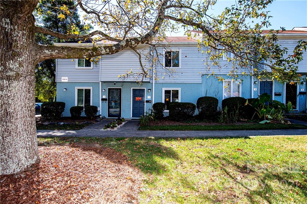 1911 Smoke Ridge Court Charlotte, NC 28210 - Photo 2 of 15 a view of a house with swimming pool and sitting area