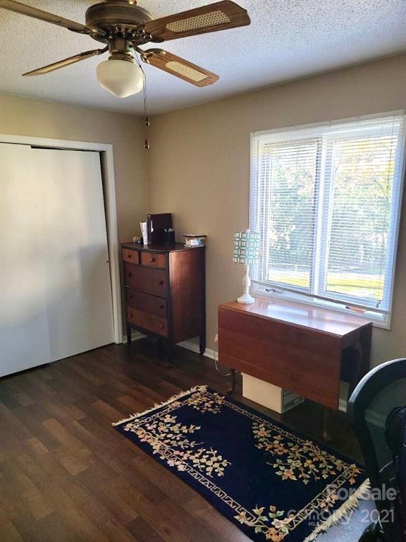 1911 Smoke Ridge Court Charlotte, NC 28210 - Photo 6 of 15 a bedroom with a bed and wooden floor