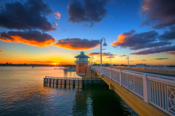 a view of balcony with wooden floor