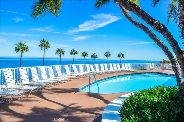 a view of a street with a building in the background