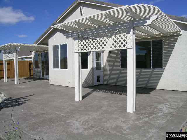 1705 Canyon Shadow Circle Reno, NV 89521 - Photo 6 of 8 a view of a house with a outdoor space