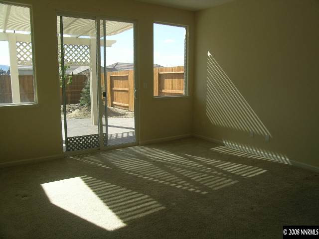 1705 Canyon Shadow Circle Reno, NV 89521 - Photo 8 of 8 a view of an empty room with a window