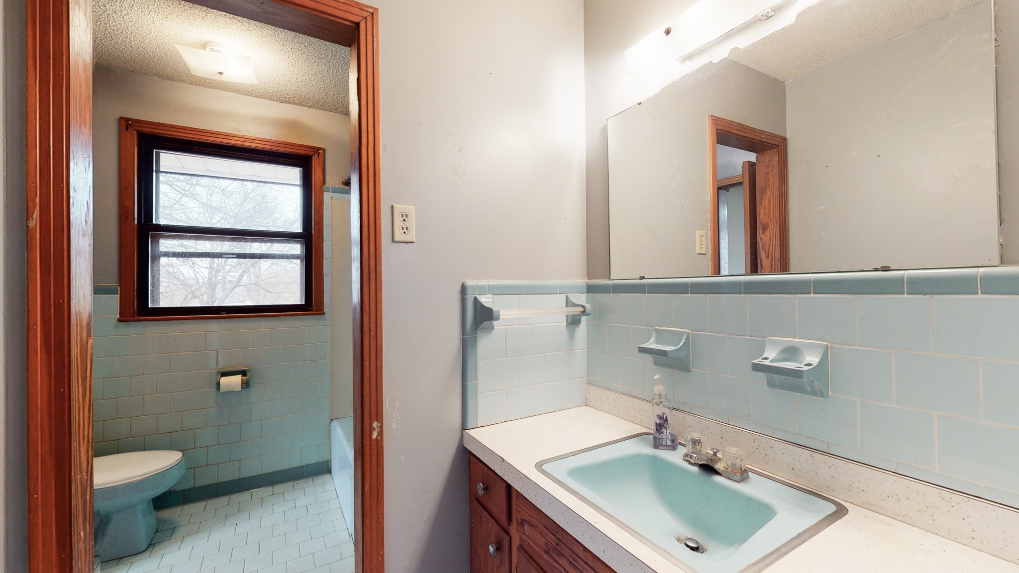 5078 Boyd Holland Road Springfield, TN 37172 - Photo 44 of 46 a bathroom with a sink toilet and mirror