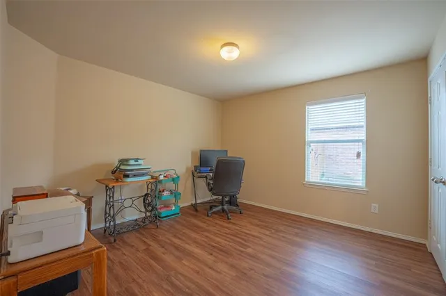 a workspace with furniture and a window