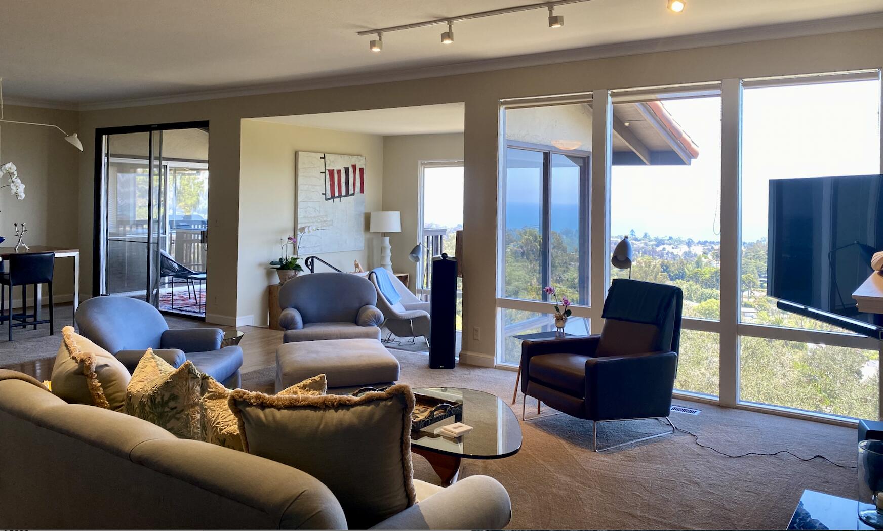 174 Coronada Circle Santa Barbara, CA 93108 - Photo 11 of 33 a living room with furniture and a flat screen tv