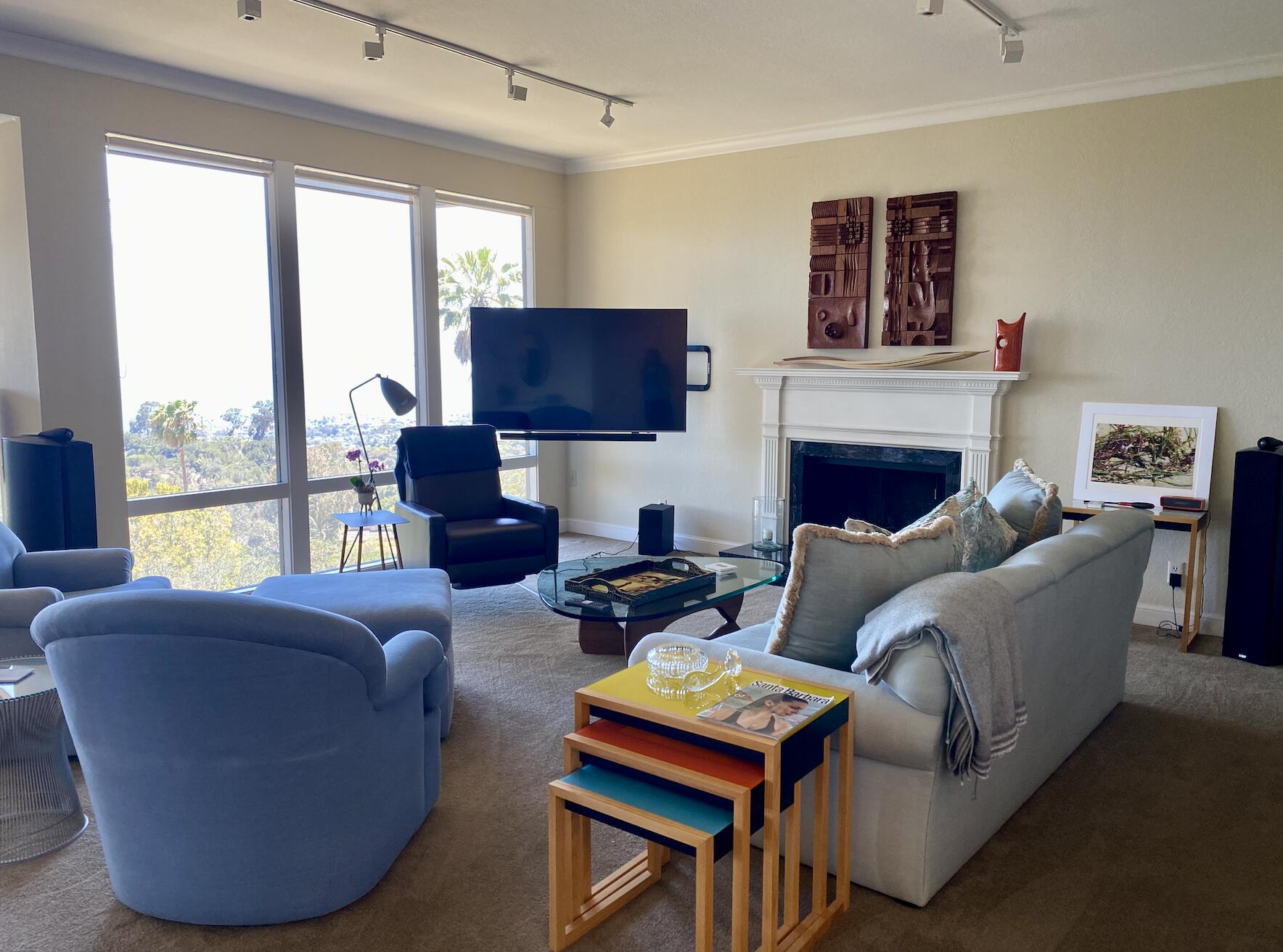174 Coronada Circle Santa Barbara, CA 93108 - Photo 13 of 33 a living room with fireplace furniture and a flat screen tv