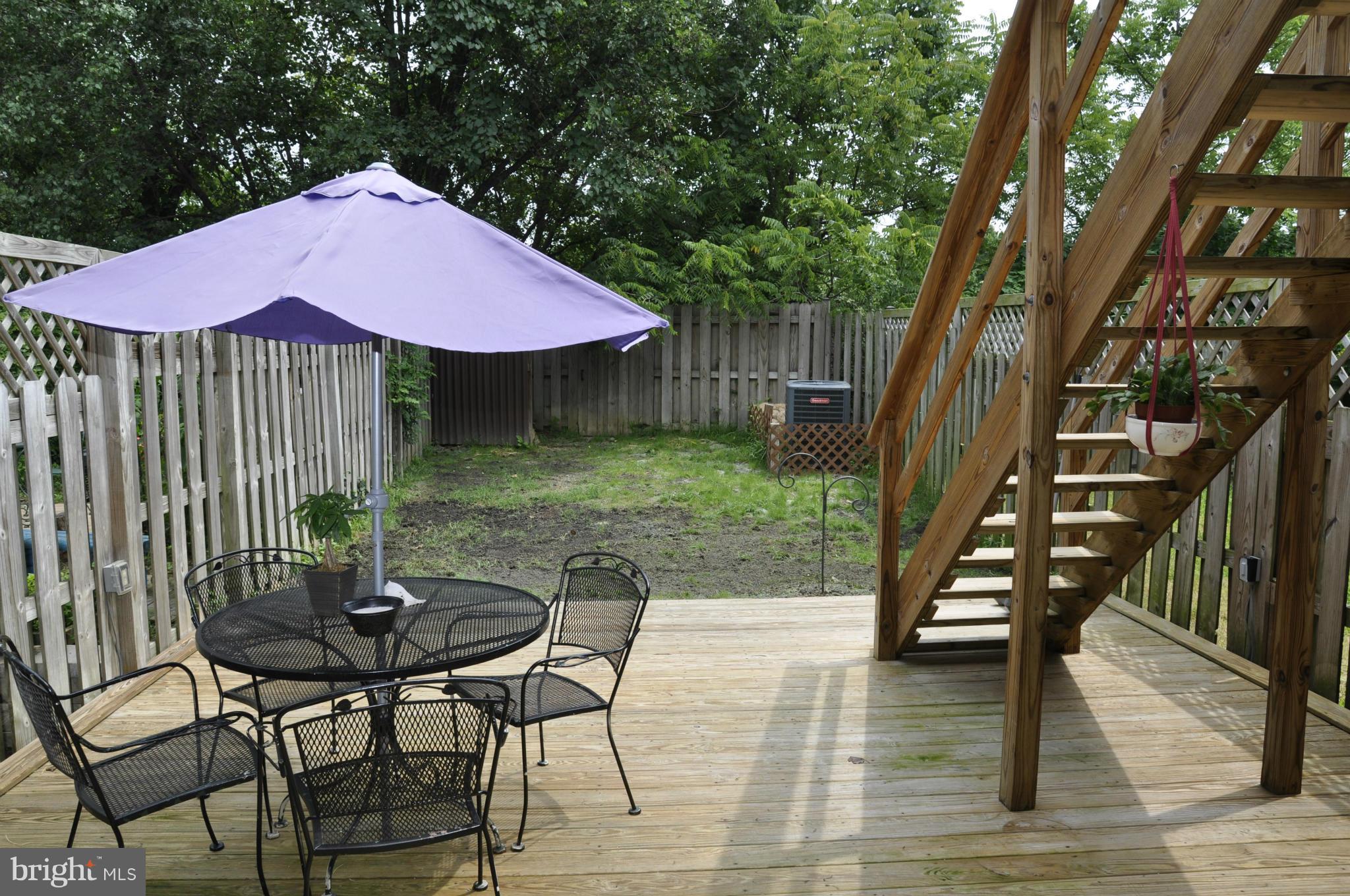 113 River Road Occoquan, VA 22125 - Photo 17 of 18 a patio with table and chairs
