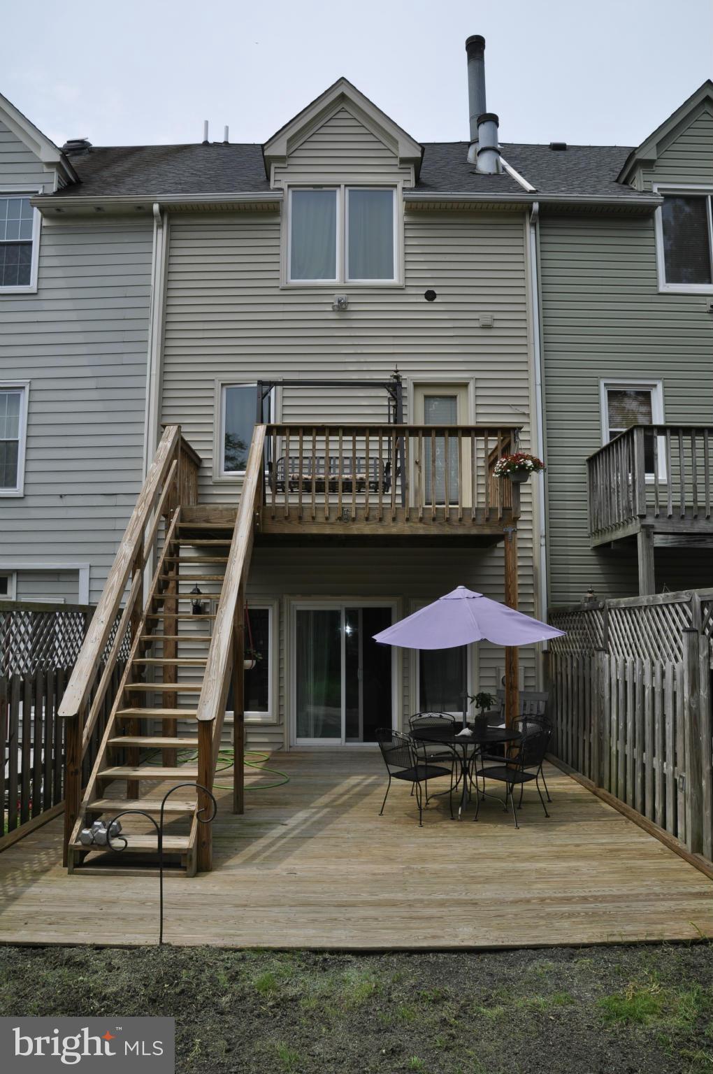 113 River Road Occoquan, VA 22125 - Photo 18 of 18 a front view of a house with table and chairs