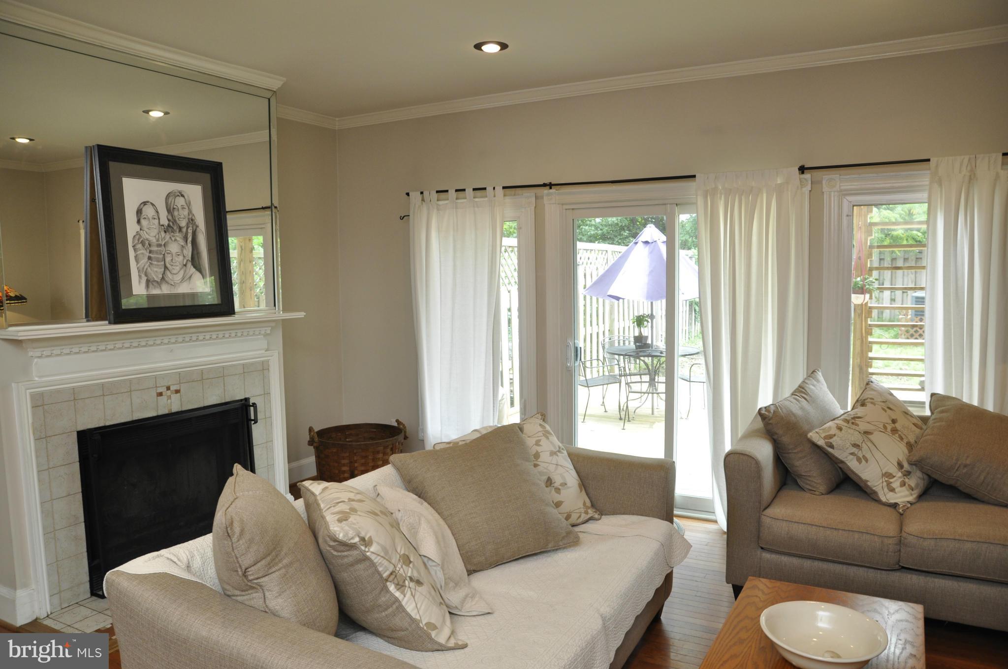 113 River Road Occoquan, VA 22125 - Photo 6 of 18 a living room with furniture and a fireplace