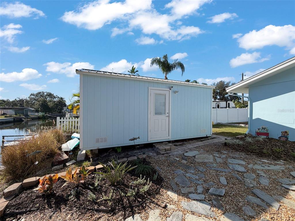 8716 Green Street Port Richey, FL 34668 - Photo 36 of 42 a backyard of a house