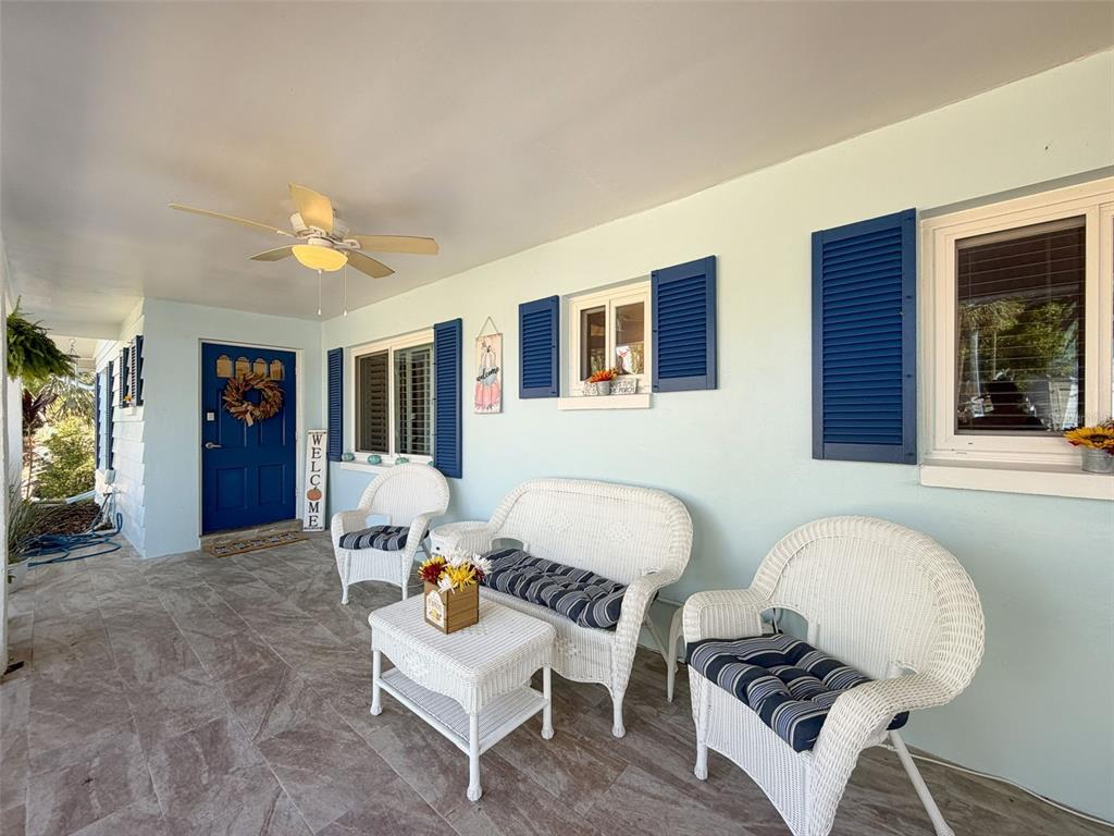 8716 Green Street Port Richey, FL 34668 - Photo 5 of 42 a living room with furniture and window